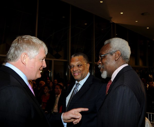 Winston Sill / Freelance Photographer
The Official Opening of Digicel Regional Headquarters by Prime Minister Portia Simpson-Miller, held at Ocean Boulevard on Tuesday March 19, 2013. Here are Denis O'Brien (left), Chairman, Digicel Group; Dr. Peter Phillips (centre), Minister of Finance; and PJ Patterson (right), former Prime Minister.
