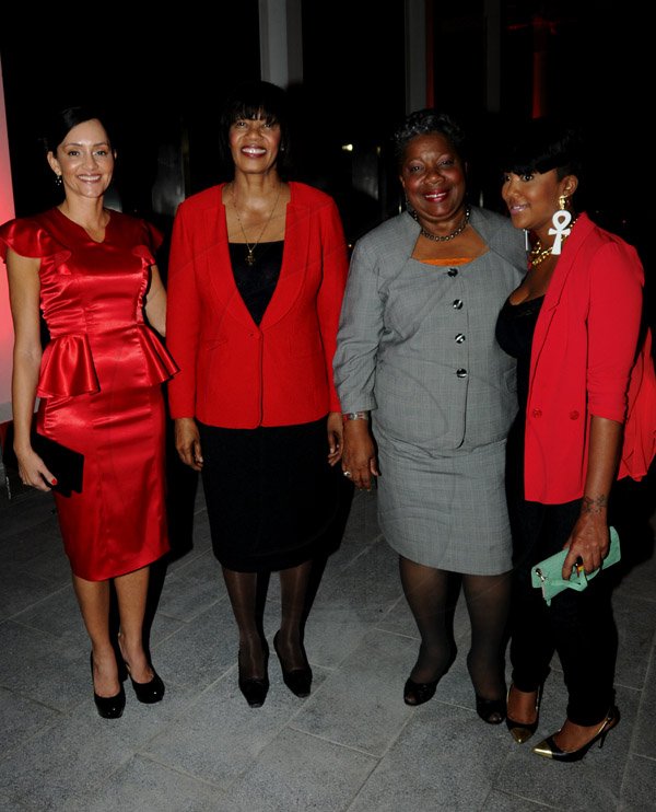 Winston Sill / Freelance Photographer
The Official Opening of Digicel Regional Headquarters by Prime Minister Portia Simpson-Miller, held at Ocean Boulevard on Tuesday March 19, 2013. Here are Ann-Marie Vaz (left); Prime Minister Portia Simpson-Miller Second left); Carrole Guntley (second right); and Tifa (right).