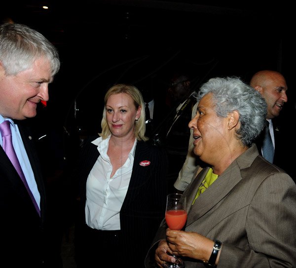 Winston Sill / Freelance Photographer
The Official Opening of Digicel Regional Headquarters by Prime Minister Portia Simpson-Miller, held at Ocean Boulevard on Tuesday March 19, 2013. Here are Denis O'Brien (left), Chairman, Digicel Group; Antonia Graham (centre), Head of Public Relations, Digicel Group; and Marjorie Kennedy (right).