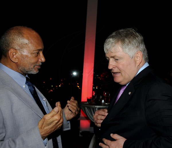 Winston Sill / Freelance Photographer
The Official Opening of Digicel Regional Headquarters by Prime Minister Portia Simpson-Miller, held at Ocean Boulevard on Tuesday March 19, 2013. Here are Douglas Orane (left); and Denis O'Brien (right), Chairman, Digicel Group.