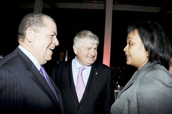 Winston Sill / Freelance Photographer
The Official Opening of Digicel Regional Headquarters by Prime Minister Portia Simpson-Miller, held at Ocean Boulevard on Tuesday March 19, 2013, Here are Audley Shaw (left); Denis O'Brien (centre), Chairman, Digicel Group; and Suzonne Saunders (right), Head, Digicel Business Solutions.