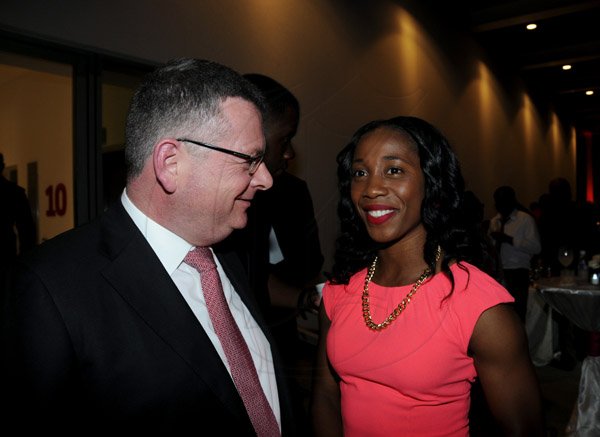 Winston Sill / Freelance Photographer
The Official Opening of Digicel Regional Headquarters by Prime Minister Portia Simpson-Miller, held at Ocean Boulevard on Tuesday March 19, 2013. Here are Colm Delves (left), CEO, Digicel Group; and Shelly-Ann Fraser-Pryce (right).