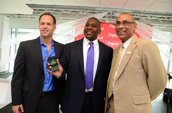 Gladstone Taylor / Photographer

l-r Sean Killen (Director-Carribbean, Blackberry) , Richard Burey (Manager Territory Channels, Blackberry) and Patrick King (Distributions Director, Digicel)


Digicel launches the Blackberry Q10 at their ocean boulevard head office yesterday afternoon