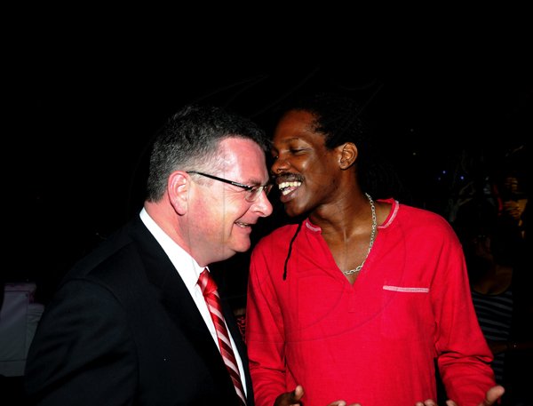 Winston Sill / Freelance Photographer
Digicel launch 4G Service. held at Victoria Pier, Ocean Boulevard on Monday night June 25,. 2012. Here are Colm Delves (left), CEO, Digicel Group; and Minister Damion Crawford (right).