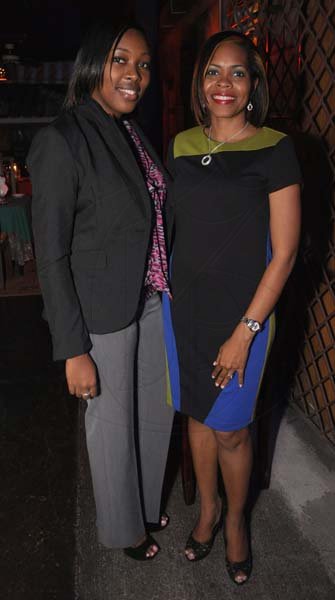 Jermaine Barnaby/Photographer
Fashaya Johnson (left) with Simone Mahabeer at The Gleaner's Pre-Restaurant Week Dinner Promotions 2013 with Karin Cooper and guests at  Red Bones on 
Tuesday, November 5, 2013.