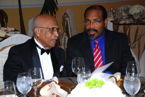 Colin Hamilton/Freelance Photographer
The Association of Consultant Physitians of Jamaica held it's 10th Annual President's Dinner in celebration of Jamaica's 50th Anniversary of Independence at the Terra Nova All Suites Hotel on Saturday September 8, 2012.

From left,  Doctors John Hall and Edwin Tulloch-Reid converse over dinner.
