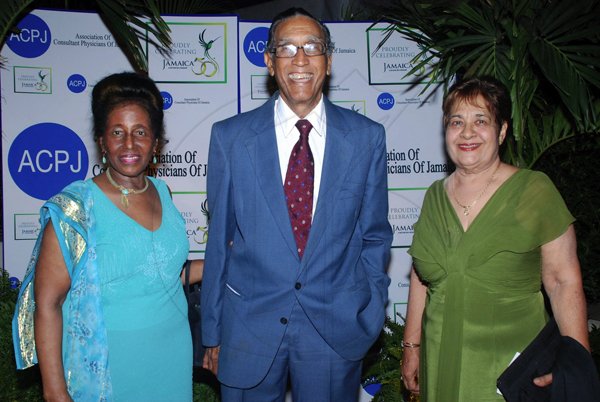Colin Hamilton/Freelance Photographer
The Association of Consultant Physitians of Jamaica held it's 10th Annual President's Dinner in celebration of Jamaica's 50th Anniversary of Independence at the Terra Nova All Suites Hotel on Saturday September 8, 2012.

 Dr. Knox Hagley is flanked on the left by Marion Mangatal, and on the right by his wife Carol Hagley.