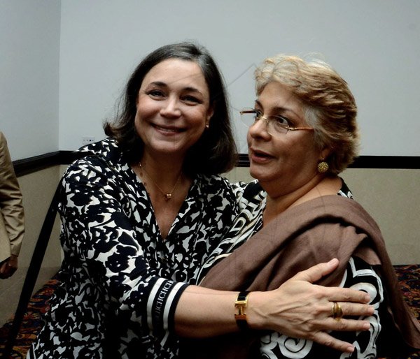 Winston Sill/Freelance Photographer
The Diplomatic Corps host Farewell Reception for departing Colombian Ambassador Luis Guillermo Martinez Fernandez, held at Jamaica Pegasus Hotel, New Kingston on Friday night January 30, 2015. Here are  Sylvia Ruschel (left); and the Colombian Ambassador's wife (right).