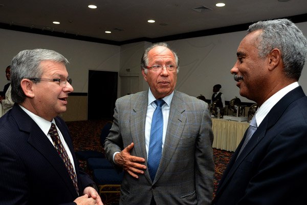 Winston Sill/Freelance Photographer
The Diplomatic Corps host Farewell Reception for departing Colombian Ambassador Luis Guillermo Martinez Fernandez, held at Jamaica Pegasus Hotel, New Kingston on Friday night January 30, 2015. Here are Bernardo Hernandez (left), Cuban Ambassador; Luis Guillermo Fernandez (centre); and ----??????? (right).