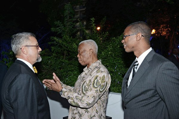 Winston Sill/Freelance Photographer
Minister of  Foreign Affairs and Foreign Trade Arnold J Nicholson host Diplomatic Week Reception, held at the Jamaica Pegasus Hotel, New Kingston on Monday night February 3, 2014. Here are Antonio DeCosta Silva (left), Brazil Ambassador; Minister Nicholson (centre); and Junior Minister Arnaldo Brown (right).