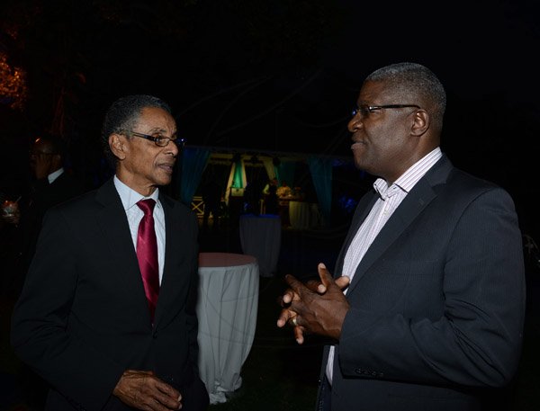 Winston Sill/Freelance Photographer
Minister of  Foreign Affairs and Foreign Trade Arnold J Nicholson host Diplomatic Week Reception, held at the Jamaica Pegasus Hotel, New Kingston on Monday night February 3, 2014. Here are Patrick Atkinson (left), Attorney General; and Owen Ellington (right), Commissioner of Police.