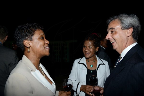 Winston Sill/Freelance Photographer
Minister of  Foreign Affairs and Foreign Trade Arnold J Nicholson host Diplomatic Week Reception, held at the Jamaica Pegasus Hotel, New Kingston on Monday night February 3, 2014. Here are Lesline Mae (left); Ambassador Evadne Coye (centre); and Ariel Fernandez (right), Argentine Ambassador.