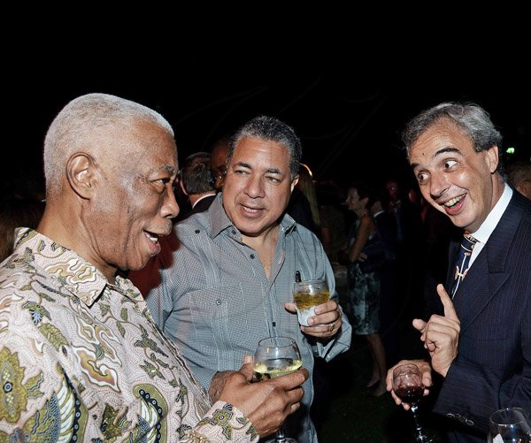 Winston Sill/Freelance Photographer
 Foreign Affairs and Foreign Trade  Minister AJ Nicholson (left) shares a jovial moment with Dr. Jose Tomas German (centre), Dominican Republic Ambassador; and Ariel Fernandez (right), Argentine Ambassador.