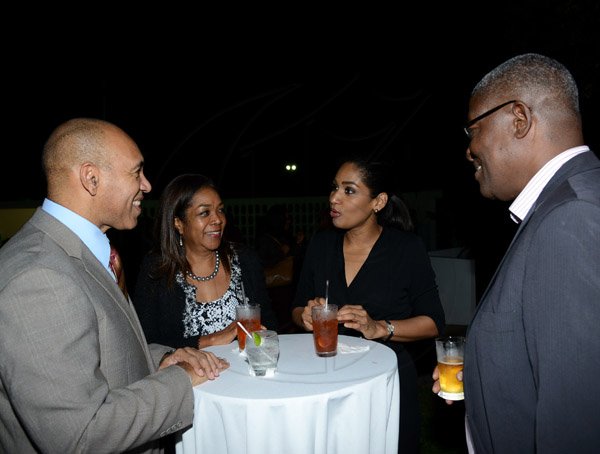 Winston Sill/Freelance Photographer
Minister of  Foreign Affairs and Foreign Trade Arnold J Nicholson host Diplomatic Week Reception, held at the Jamaica Pegasus Hotel, New Kingston on Monday night February 3, 2014. Here are Chief Of Staff Antony Anderson (left);; Jennifer McDonald (second left); Minister Lisa Hanna (second right); and Owen Ellington (right), Commissioner of Police.