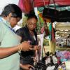 Gladstone Taylor / Photographer

Keron Campbell (left) and Diandra Smith shopping at the soho fashion tent

downtown sizzling summer savings at st williams grant park yesterday
