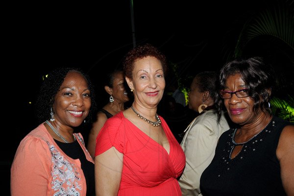 Winston Sill/Freelance Photographer
Prof. Errol Morrison host Reception for his wife Dr. Fay Morrison, who got the Prime Ministe's Medal of Appreciation, held at Kinsale Avenue, Jacks Hill on Thursday night August 1, 2013. Here are Dr. Rosalie Hamilton (left); Dorothea Gordon Smith (centre); and Scarlette Gillings (right).
