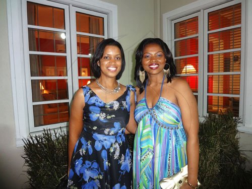 Barbara Ellington/Lifestyle Editor
Charmaine Lewis (left) and Cheryl Gray of Dress for Success show their pearly whites at last Friday evening's Dress for Success cocktail party held at the US Ambassador's residence in St Andrew.

***************************************************************** on Friday December 9, 2011.