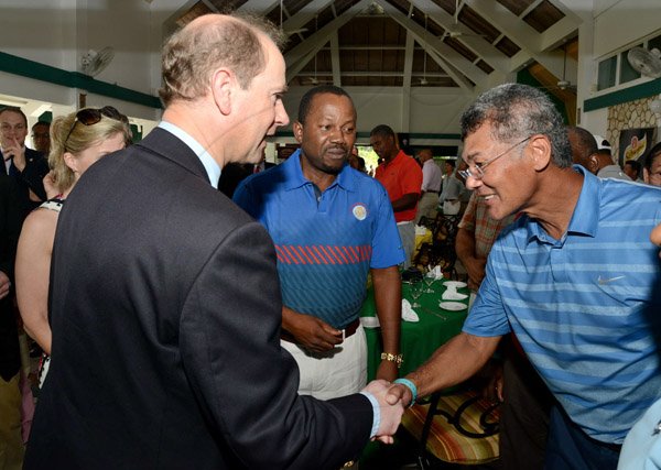 Rudolph Brown/Photographer
His Royal Highness Prince Edward, The Earl of Wessex the Duke of Edinburgh in greets Peter Chin at the Duke of Edinburgh Golf Tournament at Caymanas Golf Club on Sunday, March 2, 2014