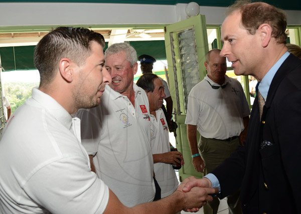 Rudolph Brown/Photographer
His Royal Highness Prince Edward, The Earl of Wessex the Duke of Edinburgh Ronan McGrane, (left) and Tom Connor at the Duke of Edinburgh Golf Tournament at Caymanas Golf Club on Sunday, March 2, 2014
