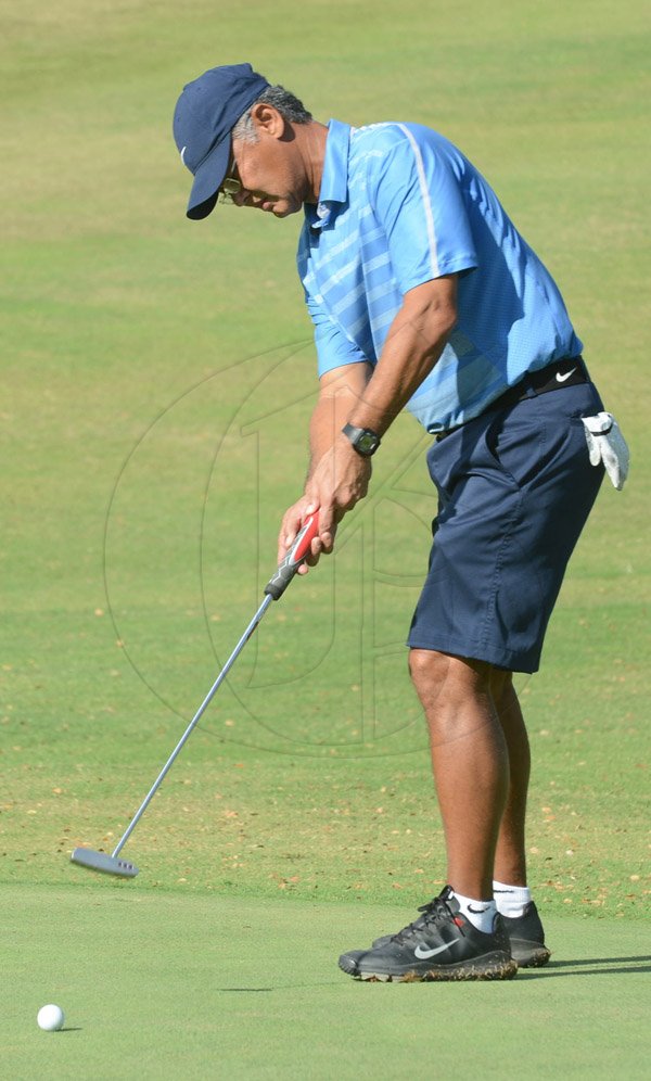Rudolph Brown/Photographer
Peter Chin play at the Duke of Edinburgh Golf Tournament at Caymanas Golf Club on Sunday, March 2, 2014