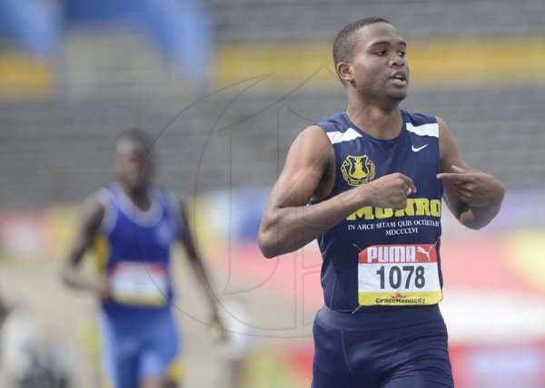 Shorn Hector/Photographer Tajay Gardner of Munroe College wins heat one of the boys class two 400 meters dash on day two of the ISSA/GraceKennedy Boys and Girls’ Athletics Championships held at the The National Stadium in Kingston on Wednesday March 27, 2019