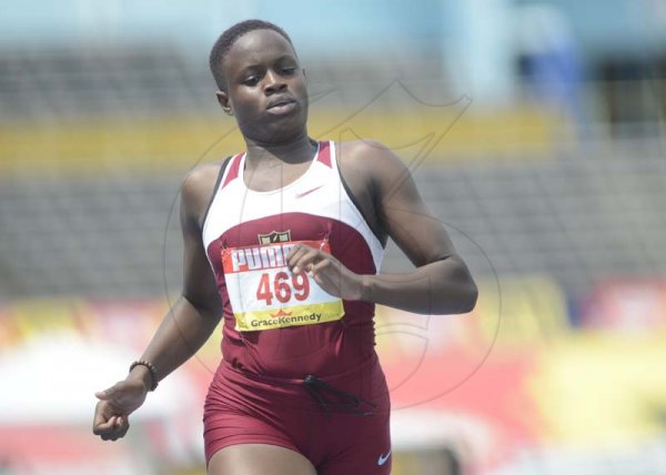 Shorn Hector/Photographer Rickiann Russell of Holmwood Technical wins heat two of the girls class three 400 meters dash on day two of the ISSA/GraceKennedy Boys and Girls’ Athletics Championships held at the The National Stadium in Kingston on Wednesday March 27, 2019