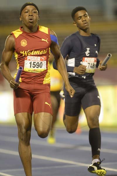 Shorn Hector/Photographer Jehlanie Gordon of Wolmer's girls anchors his team to victory in heat 3 of the boys class two 4x100 merters relay on day two of the ISSA/GraceKennedy Boys and Girls’ Athletics Championships held at the The National Stadium in Kingston on Wednesday March 27, 2019
