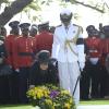 Shorn Hector/Photographer Carla Seaga lays a wreath on the entombed area of the late Edward Seaga at the National Heroes Cricleon Sunday June 23, 2019.