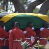 Shorn Hector/Photographer Members of the First Battalion Regiment (1JR) bearer party carry the flag drapped coffin bearing the remains of the late Edward Seag  at the National Heroes Park during the burial ceremony of the late Edward Seaga, former Prime Minister of Jamaica, on Sunday June 23, 2019