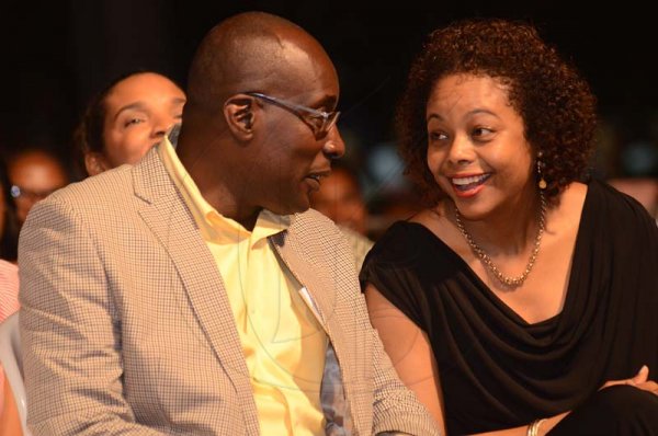Shorn Hector/Photographer  Minister of Education the Hon. Ruel Reid and Attorney General, Marlene Malahoo Forte smiling during light conversation  at the Seville Emancipation Jubilee 2018