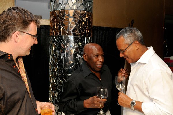 Winston Sill/Freelance Photographer
Offical opening of Everblazing Boutique, Bar and Lounge, held at Villa Ronai, Old Stony Hill Road on Tuesday night September 10, 2013. Here are Alex Dropinski (left); Gurney Beckford (centre); and Robert Haughton (right).