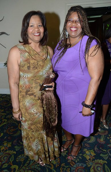 Rudolph Brown/Photographer
Jackie Hamilton, (right) poses with Debbie Clue at the Scotiabank Group Celebrating Excellence Service and Support awards ceremony at Knutsford Court Hotel in Kingston on Saturday, May 18, 2013