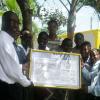 Contributed 
The Gleaners Burchell Gibson makes presentation to Happy Grove High School