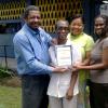 Contributed 
 Reginald Campbell of the Gleaner makse a presentation to New Day Primary School
