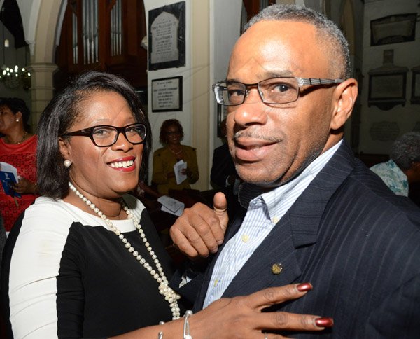 Rudolph Brown/Photographer
Lisa Bell, Managing Director, EXIM Bank greets her husband Stephen Bell at the EXIM Bank’s 30th anniversary church service at the St Andrew Parish Church on Sunday, May 1, 2016