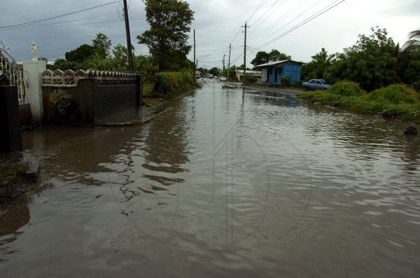 Ricardo Makyn/Staff Photographer.
Flooded Road way at Poor Man's corner in Yallahs St Thomas on Tuesday 28.9.2010.