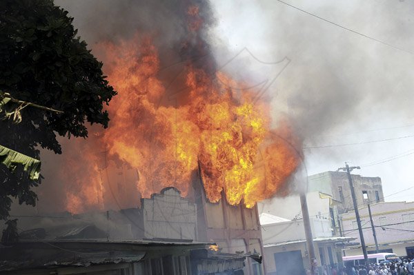 Norman Grindley/Chief Photographer
A massive fire destroyed several homes in Denham Town in West Kingston today.