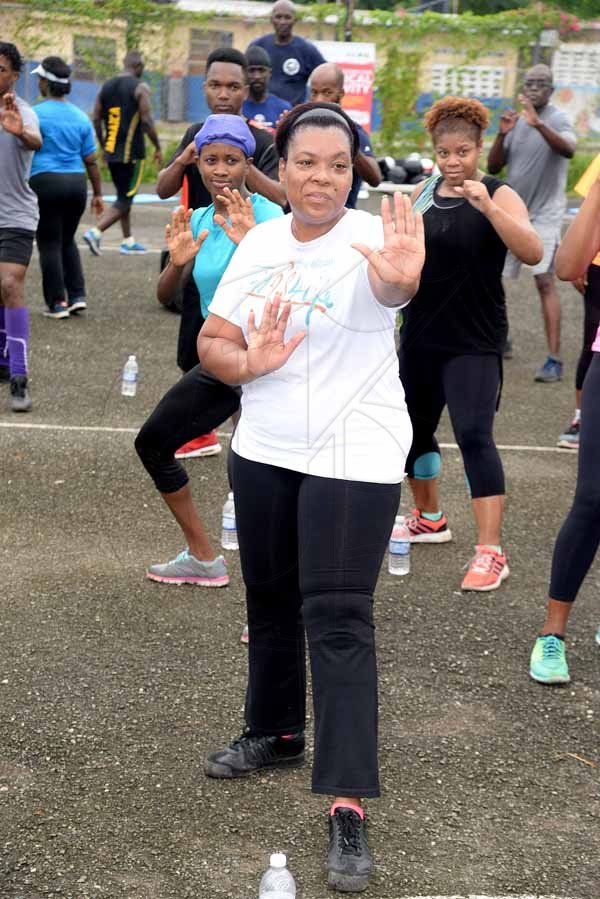 Lionel Rookwood/PhotographerThe Gleaner's Fit 4 Life event with the Trainfit Club's Outdoor Madness, Boxing Fitness with Sakima Mullings and Self Defense with Master Arthur Barrows on Saturday, November 11, at In Motion Gym, Shortwood Teachers' College, St Andrew.