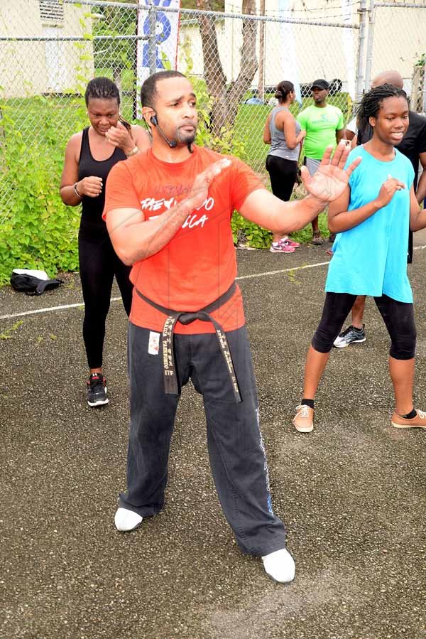 Lionel Rookwood/PhotographerThe Gleaner's Fit 4 Life event with the Trainfit Club's Outdoor Madness, Boxing Fitness with Sakima Mullings and Self Defense with Master Arthur Barrows on Saturday, November 11, at In Motion Gym, Shortwood Teachers' College, St Andrew.