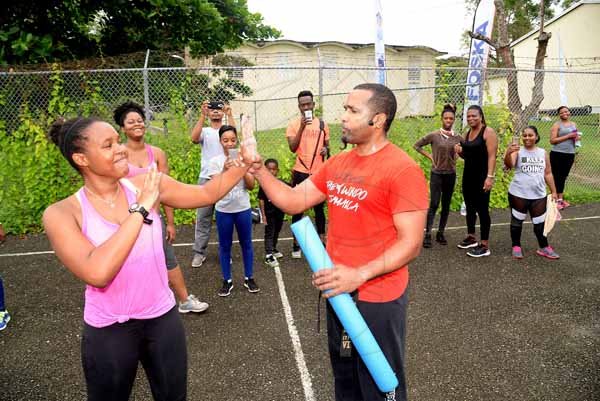 Lionel Rookwood/PhotographerThe Gleaner's Fit 4 Life event with the Trainfit Club's Outdoor Madness, Boxing Fitness with Sakima Mullings and Self Defense with Master Arthur Barrows on Saturday, November 11, at In Motion Gym, Shortwood Teachers' College, St Andrew.