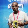 Lionel Rookwood/PhotographerThe Gleaner's Fit 4 Life event with Body By Kurt - FitMix - 3-The-Hard-Way - at 23 Haining Road, New Kingston on Saturday, October 28, 2017.  *** Local Caption *** Lionel Rookwood/PhotographerAhon Gray, winner of the Burpees Challenge, with his Active band from Asafa Powell.