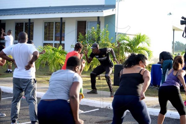 Lionel Rookwood/PhotographerThe Gleaner's Fit 4 Life boot camp with Sweet Energy Fitness Club at Jacaranda Homes in Inswood, St Catherine on Saturday, November 25, 2017