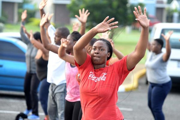 Lionel Rookwood/PhotographerThe Gleaner's Fit 4 Life boot camp with Sweet Energy Fitness Club at Jacaranda Homes in Inswood, St Catherine on Saturday, November 25, 2017