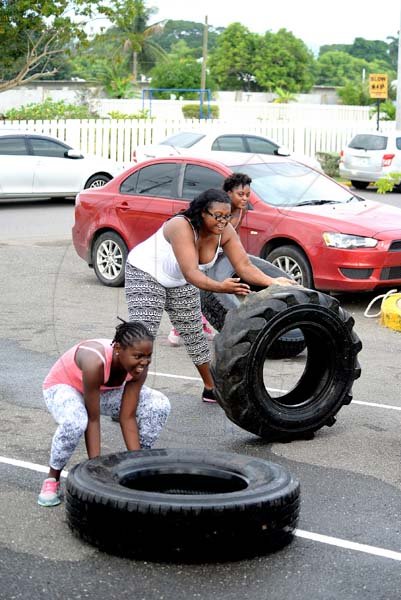 Lionel Rookwood/PhotographerThe Gleaner's Fit 4 Life boot camp with Sweet Energy Fitness Club at Jacaranda Homes in Inswood, St Catherine on Saturday, November 25, 2017 *** Local Caption *** Lionel Rookwood/PhotographerParticipants in The Gleaner's Fit 4 Life boot camp with Sweet Energy Fitness Club at Jacaranda Homes in Inswood, St Catherine on Saturday.