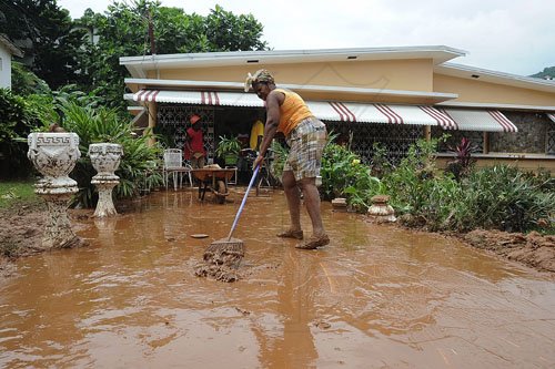 Ian Allen/Photographer
House on Riverside Drive in Havendale St.Andrew which was flooded out during rains from Tropical Storm Nicole on wednesday night.
