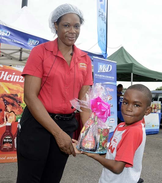 Gladstone Taylor / Photographer

David Hamilton claims first prize in the Hoola hoop competition as seen at the Gleaner company food moth promotion held at shoppers fair super market on brunswick avenue, spanish town on saturday