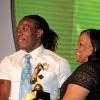 Winston Sill/Freelance Photographer
Minister with responsibility for Sports, Natalie Neita-Headley (right) makes a presentation to Jermaine 'Tuffy' Anderson of Waterhouse FC during the Red Stripe League Awards Ceremony, held at Courtleigh Auditorium on Thursday night. Anderson walked with four awards.