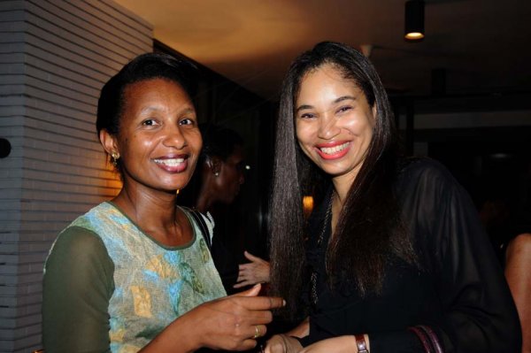 Winston Sill/Freelance Photographer
French Ambassador host Reception and  Evening of Entertainment with Dr. Jean Small, held at Hillcrest Avenue, St. Andrew on Friday night September 20, 2013. Here are Mylene Ferriera (left); and Nicole Hoo-Fatt (right).