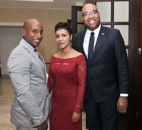 Ashley Anguin photo<\n>From Left- Omar Robinson (JHTA President) poses with Barbara Burton (GM Jewel Grande Resorts) and Delano Seiveright  (Senior Advisor Jamaican Government) <\n><\n><\n><\n>