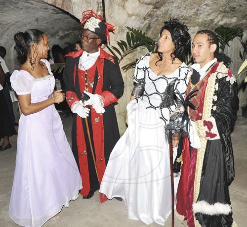 Photo by Christopher Thomas

Engaged in conversation are (from left): Tricia-Ann Bicarie, Victoria Mutual Wealth Management representative; Dr. David Lambert, a Cuban guest; Trina Delisser, chairwoman of the St. James Georgian Society; and Ernesto Castro, Cuban costume designer who built the outfits for the ball.